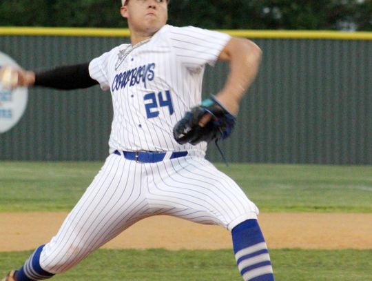 Edna pitcher Jaykub Reyes fires a pitch against Columbus High School.