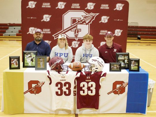 Ganado senior Dylan Holt signs a letter of intent to play football at Howard Payne University.