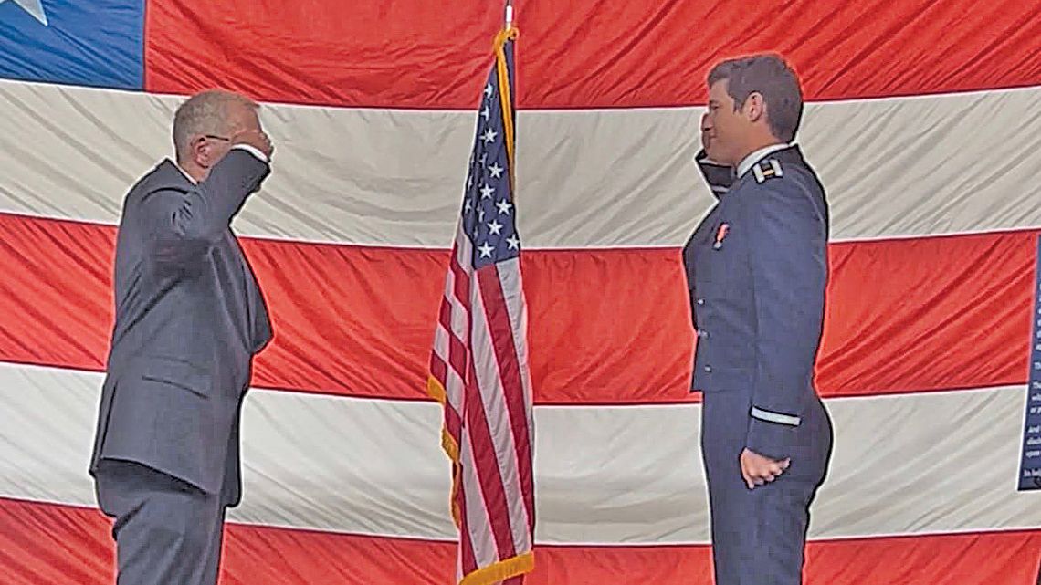 Industrial graduate receives first salute from former coach Industrial graduate receives first salute from former coach